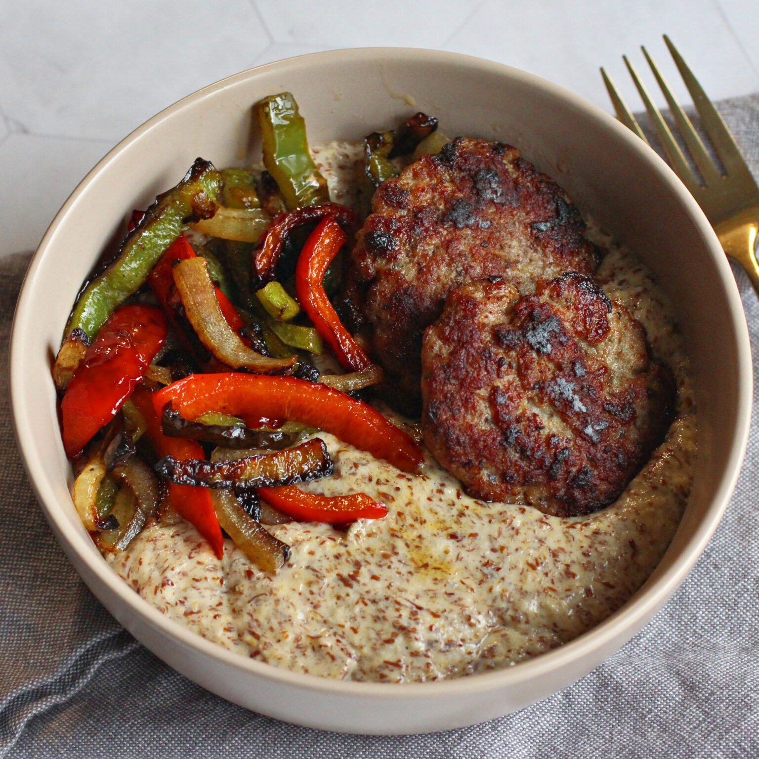 Savory "NOatmeal" bowls with sausage peppers and onions Gluten Free